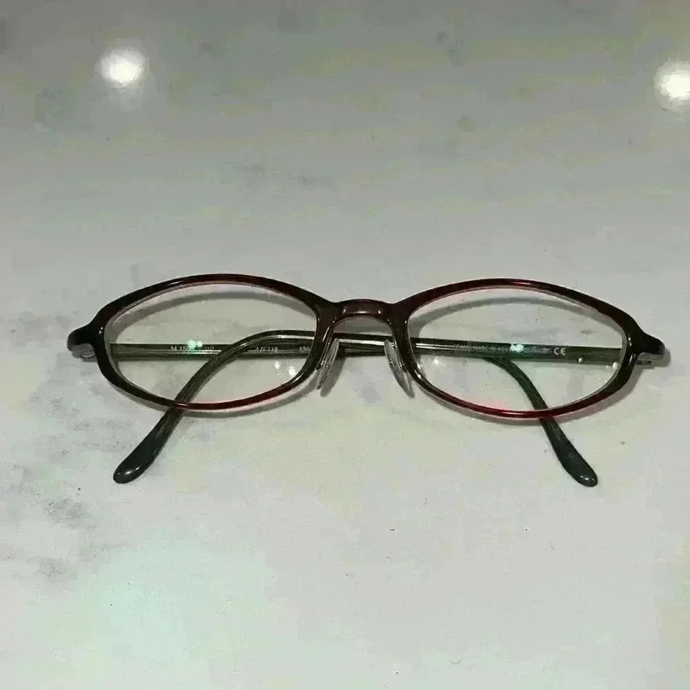 Brown and green frame glasses
